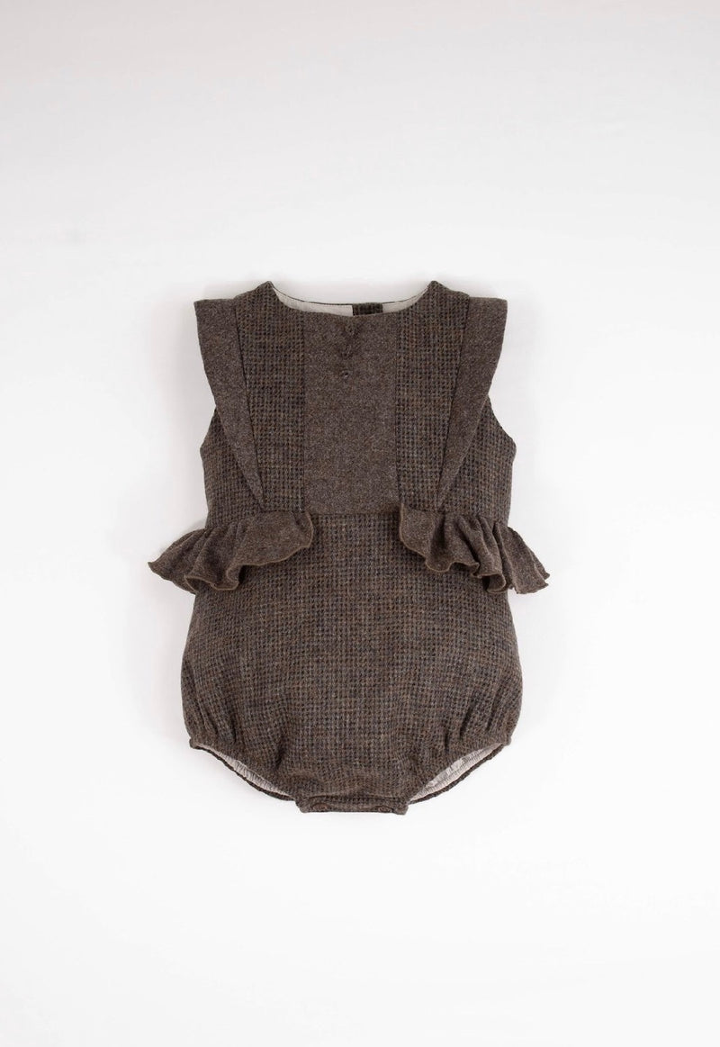 Multi-coloured woollen romper suit with frill